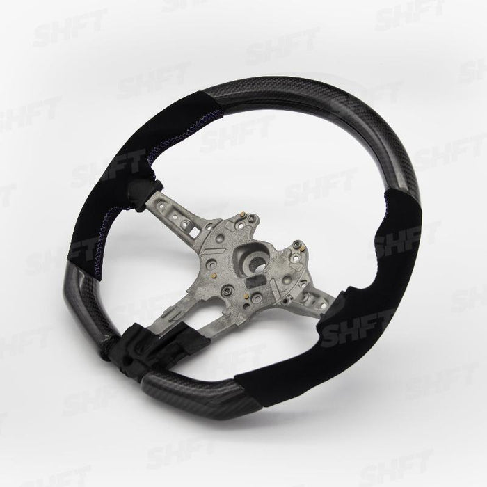 R44 BMW FLAT BOTTOM STEERING WHEEL IN GLOSS CARBON WITH MOLDED ALCANTARA GRIPS